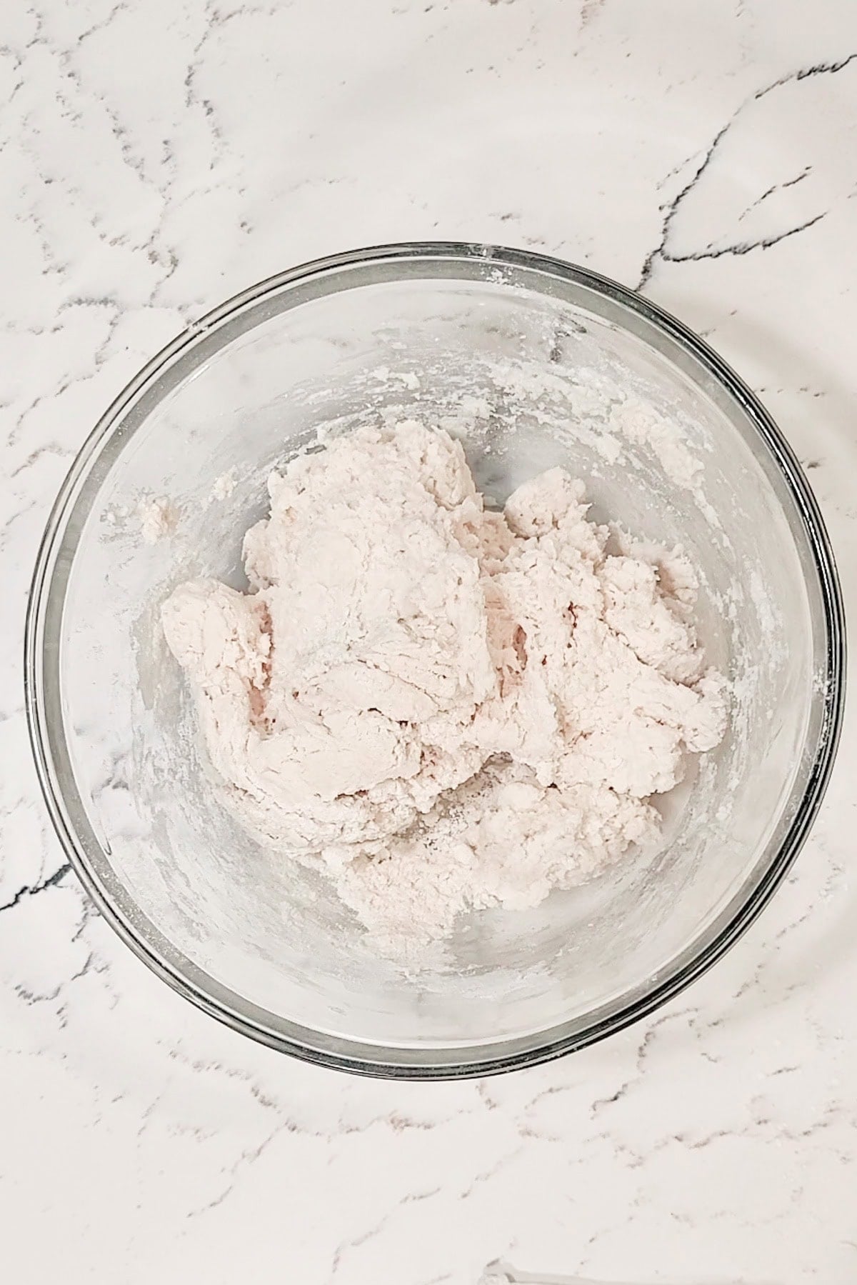A bowl of sticky dough.
