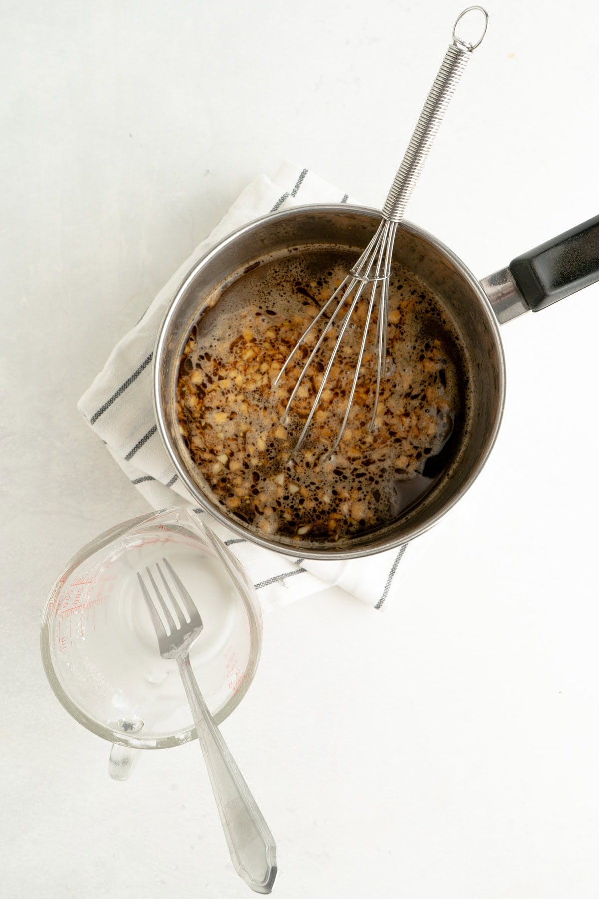 Teriyaki sauce having a cornstarch slurry whisked in.
