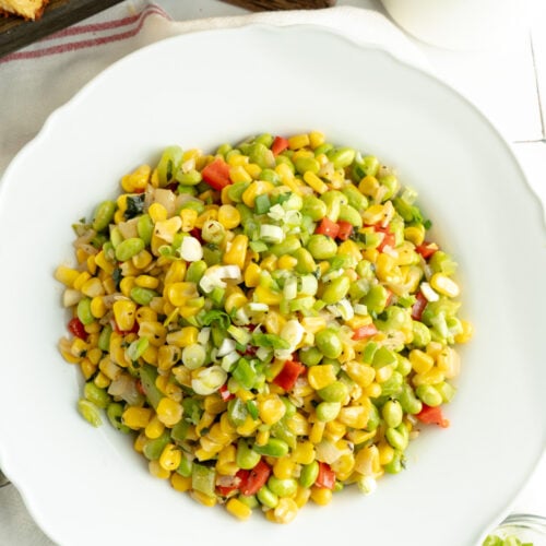 A Corn Succotash Recipe in a white bowl.