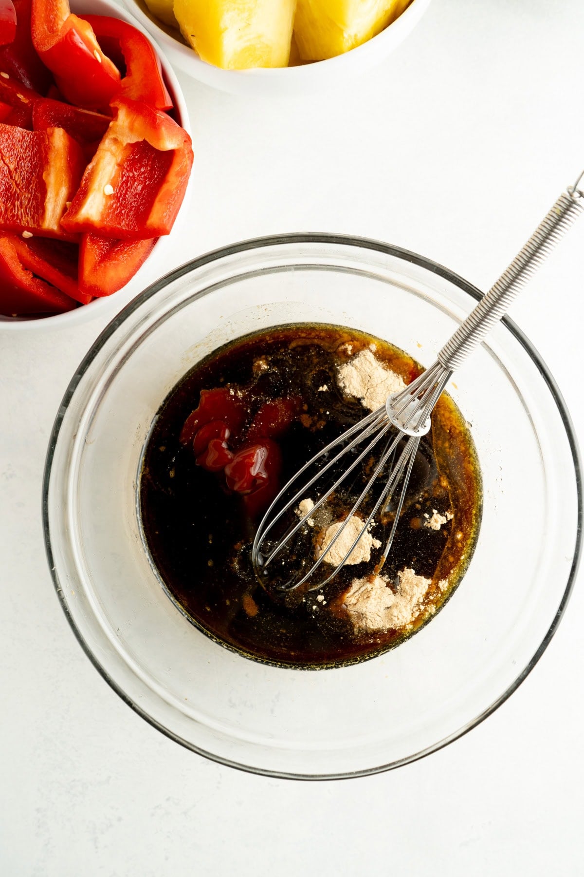 A bowl of ingredients for a sweet soy marinade.