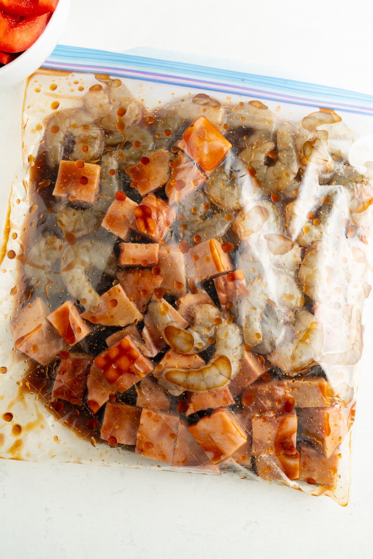 Ham and shrimp in a resealable bag with a soy marinade.