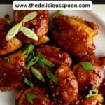 Pinterest pin showing a platter of honey garlic chicken.