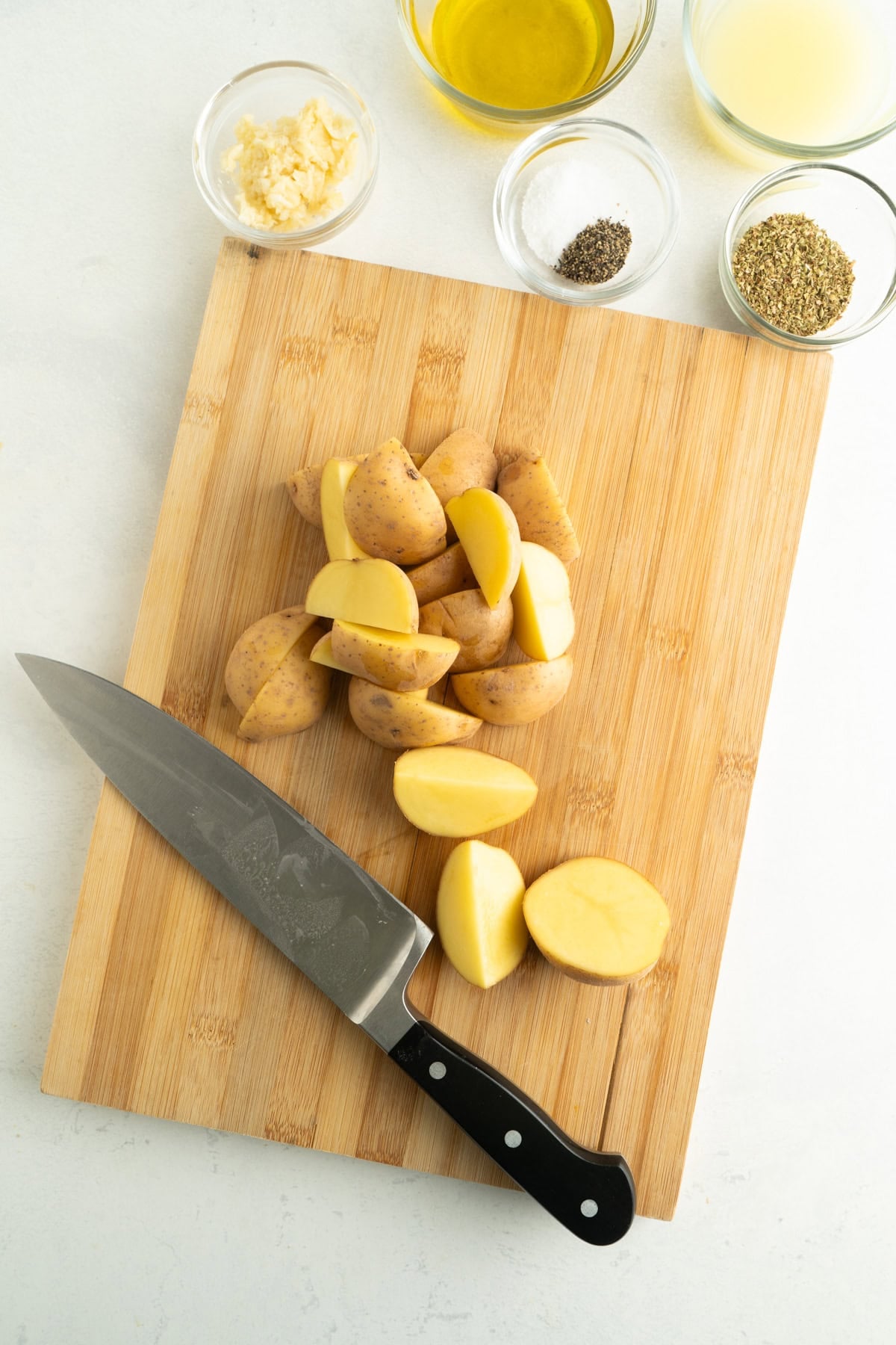 Chopped potatoes on a cutting board.