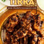 Pinterest pin showing a plate of tandoori chicken tikka.