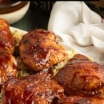 Pinterest pin showing air fryer bbq chicken thighs.