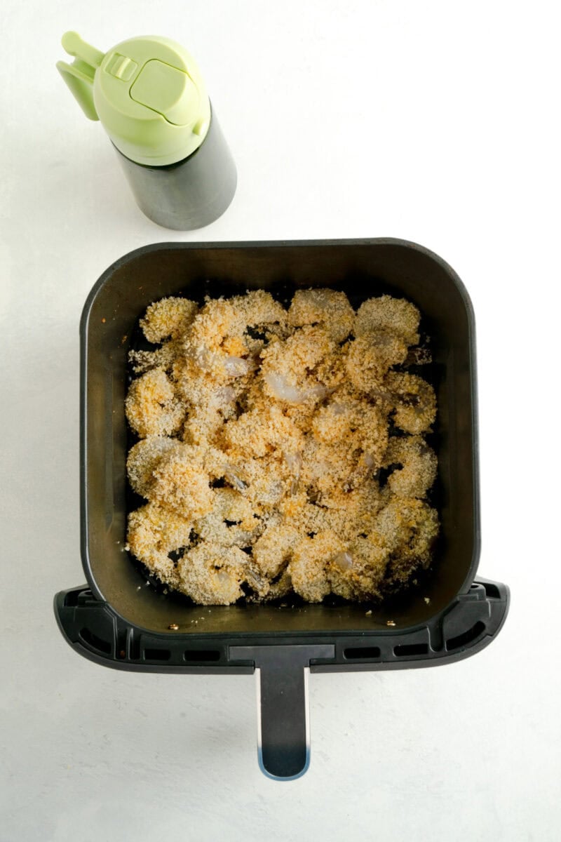 Panko breaded shrimp in an air fryer.