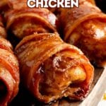 Pinterest pin showing bacon wrapped chicken on a wood cutting board.