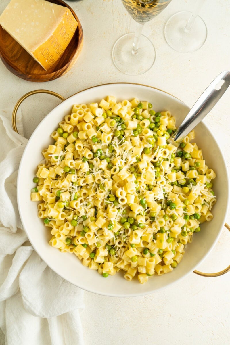 Overhead shot of a bowl of pasta e piselli.