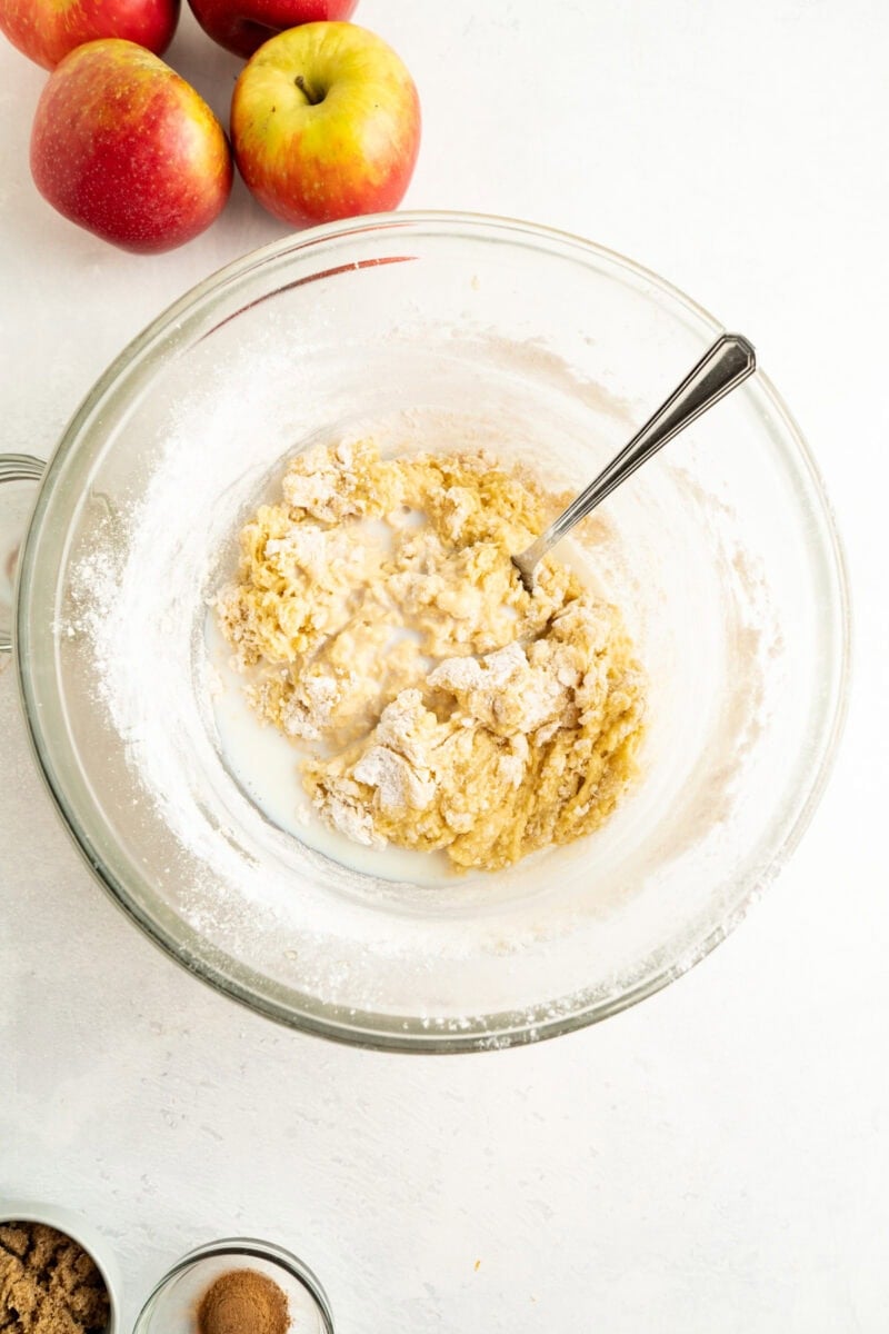 Flour being mixed into cake batter.