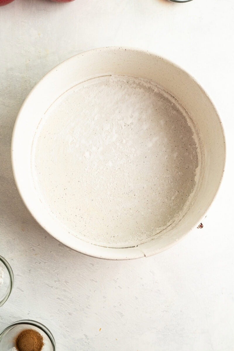 A floured spring form pan.