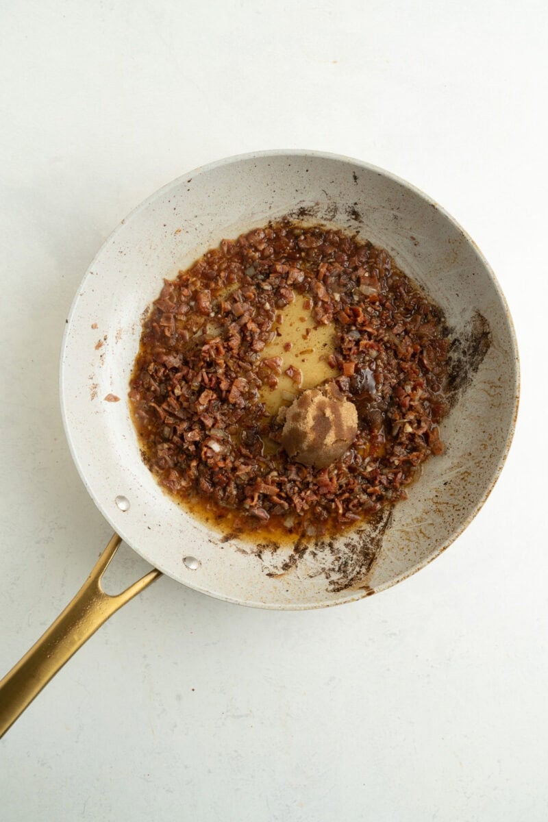 Bacon jam ingredients in a pan.