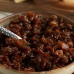 Pinterest pin showing a bowl of bacon jam.